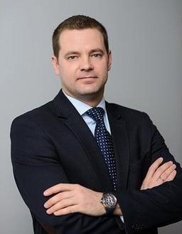 Dr.iur., prof. Janis Karklins, Managing partner logo