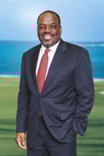 John F. Wilson QC, Senior Partner logo